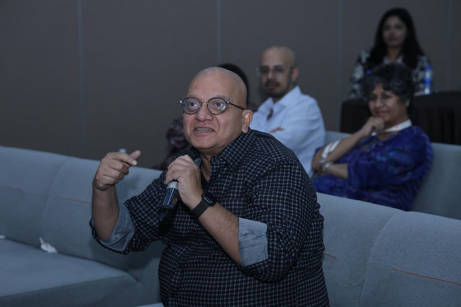 An audience member asking a question during a session