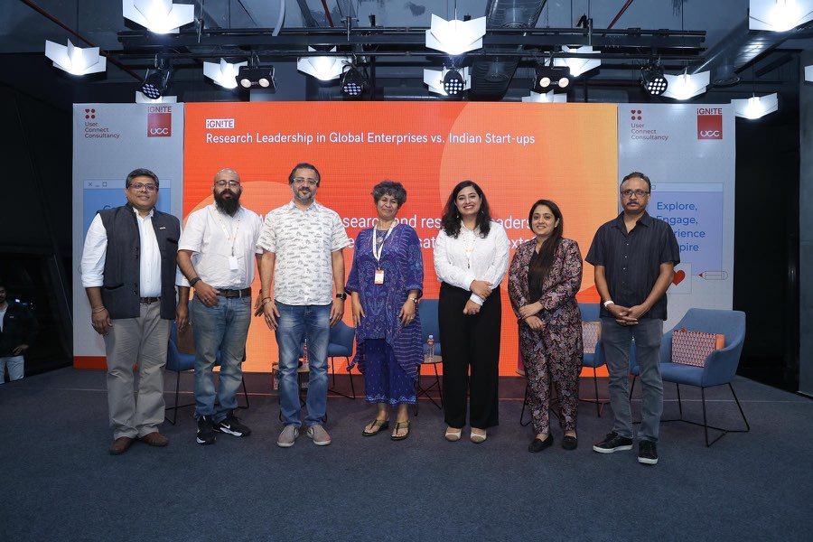 Panelists on stage for the session Research Leadership in Global Enterprises vs. Indian Start-ups